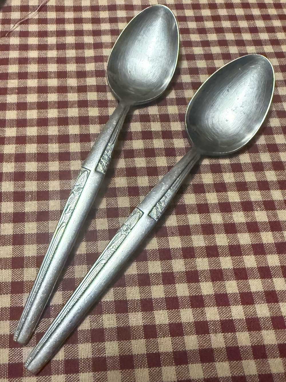Pair of Silver-Tone Decorative Dining Spoons